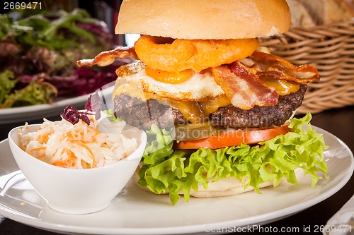 Image of Delicious egg and bacon cheeseburger