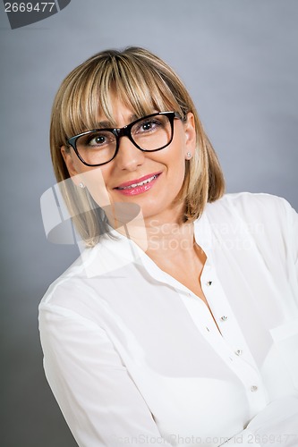 Image of Scholarly attractive woman in glasses
