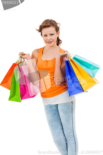 Image of Happy attractive young shopaholic