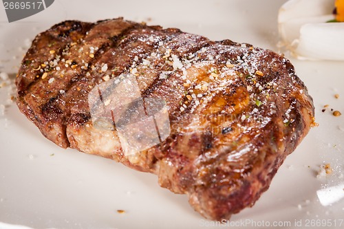 Image of Grilled beef steak with seasoning