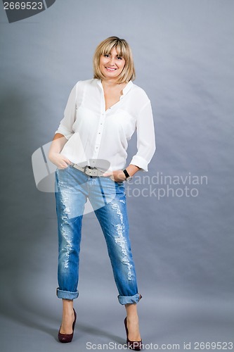 Image of Trendy middle-aged woman with a charming smile