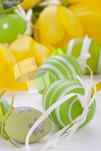 Image of Colourful yellow and green spring Easter Eggs