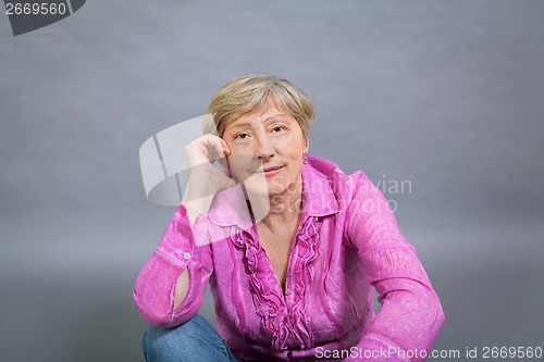 Image of Beautiful blond trendy senior lady