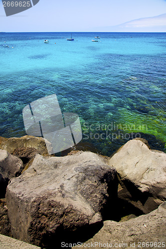 Image of yacht spain  boat in the blue sky   arrecife teguise lanzarote 