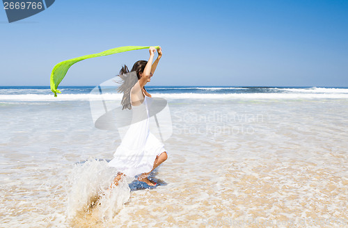 Image of Jumping with a green tissue