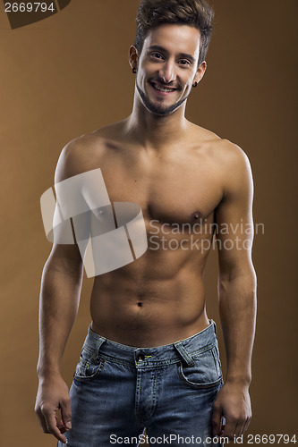 Image of Shirtless male smiling