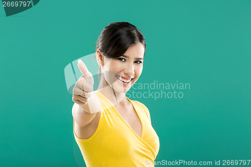 Image of Happy woman with thumbs up