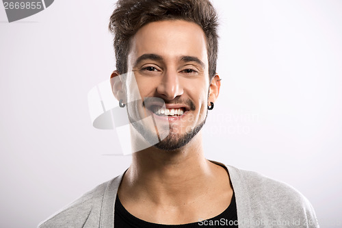 Image of Young man smiling