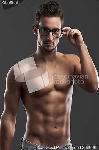 Image of handsome shirtless male model