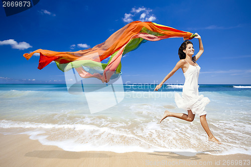 Image of Jumping with a colored tissue