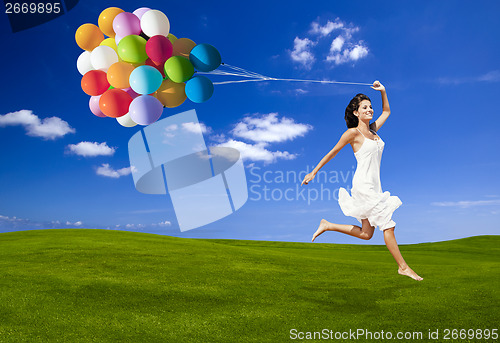 Image of Jumping with a colored ballons