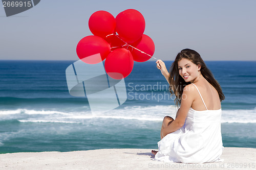 Image of Girl with red ballons