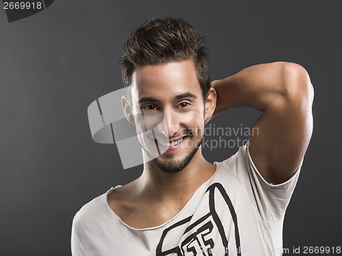 Image of Young man  smiling