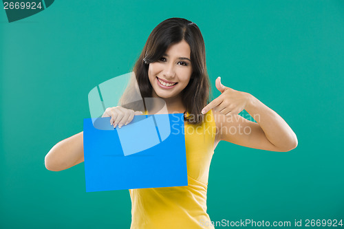 Image of Holding a blue paper