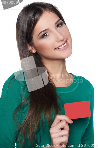 Image of Smiling female showing blank credit card