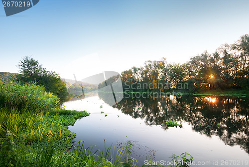 Image of Sunset by the river