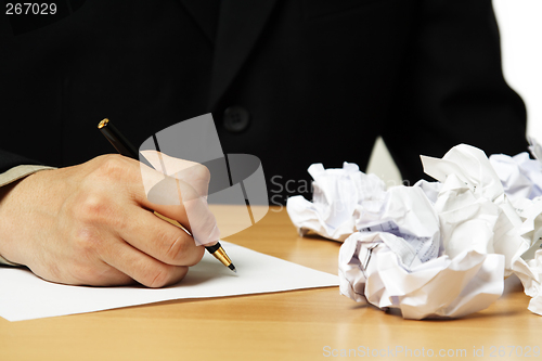 Image of Writing businessman