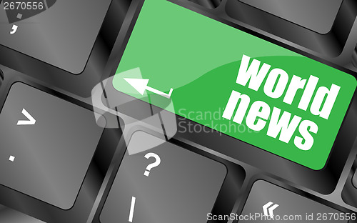 Image of words world news on computer keyboard key