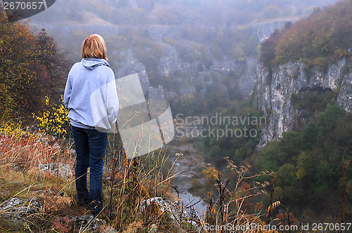 Image of Caucasian Lady on the Edge of the Canyon