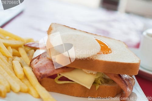 Image of Sandwich with egg french fries