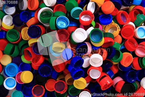 Image of color plastic caps background