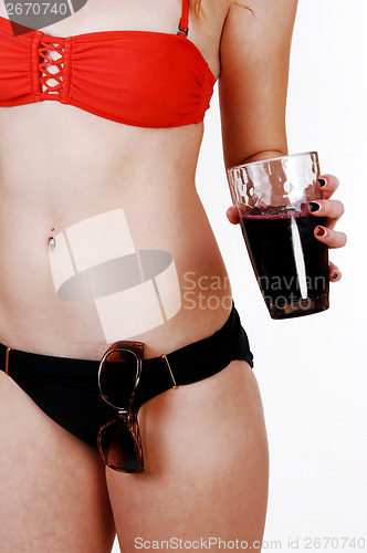 Image of Bikini girl with drink.