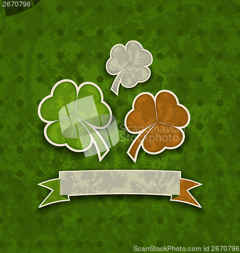 Image of Holiday background with clovers in Irish flag color for St. Patr