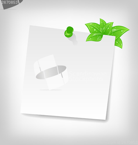 Image of blank note paper with green leaves and space for your tex