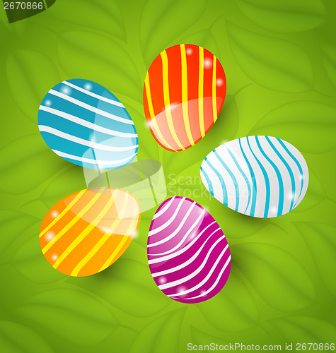 Image of Easter set colorful ornamental eggs on green leaves background