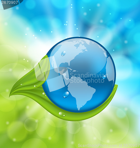 Image of Planet Earth with green leaves