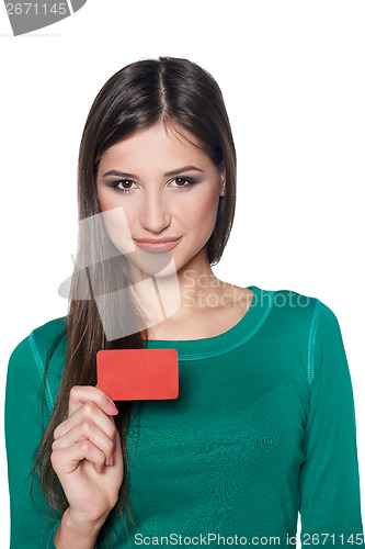 Image of Smiling female showing blank credit card