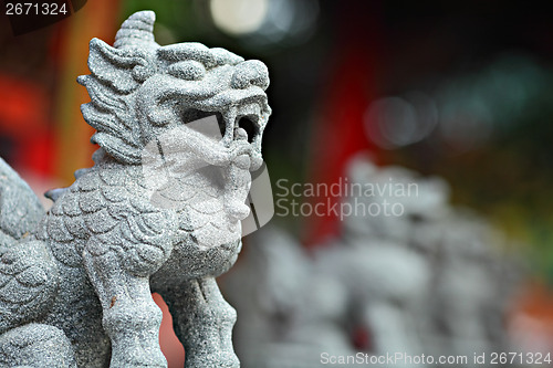 Image of Lion statue stone in front of temple