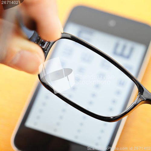 Image of Eyechart on mobile with eyewear