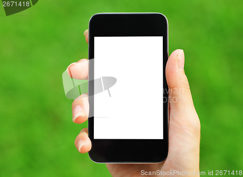 Image of Woman hand holding mobile with green background