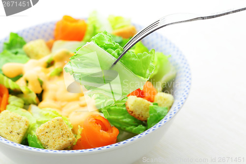 Image of Salmon salad with silver fork