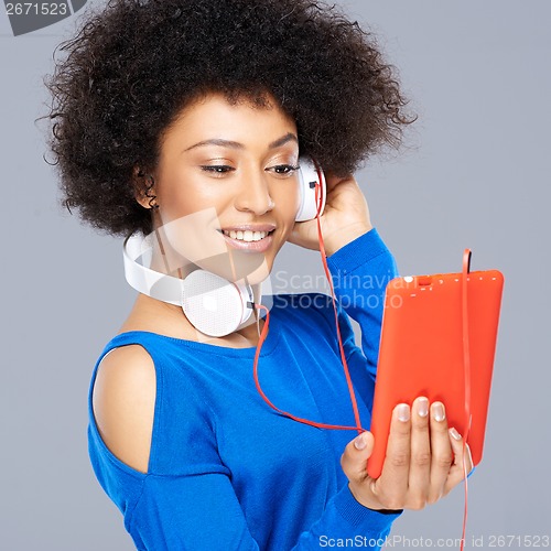 Image of Beautiful African American woman with her music