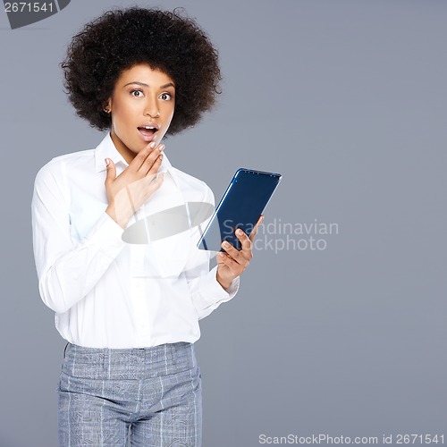 Image of Shocked beautiful African American woman