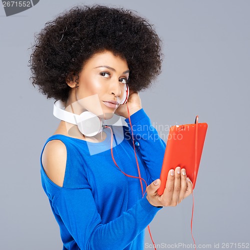 Image of Beautiful African American woman with her music