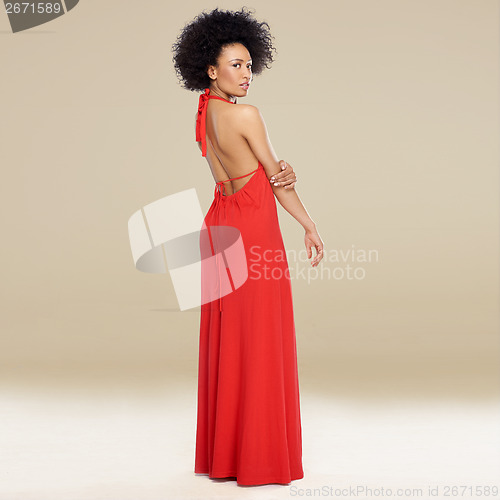 Image of Elegant African American woman in a red gown