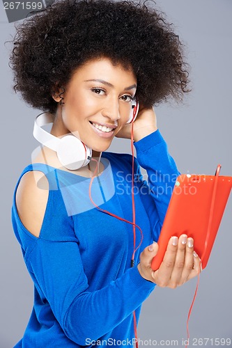 Image of Beautiful African American woman with her music