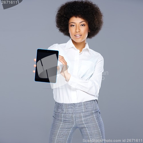Image of African American woman displaying a tablet-pc