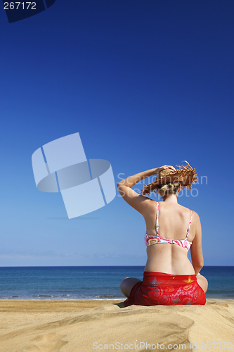 Image of Woman by Beach