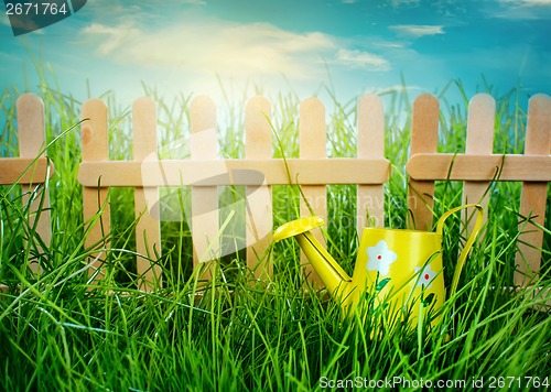 Image of Wooden fence on blue sky background