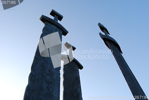 Image of Swords in rock