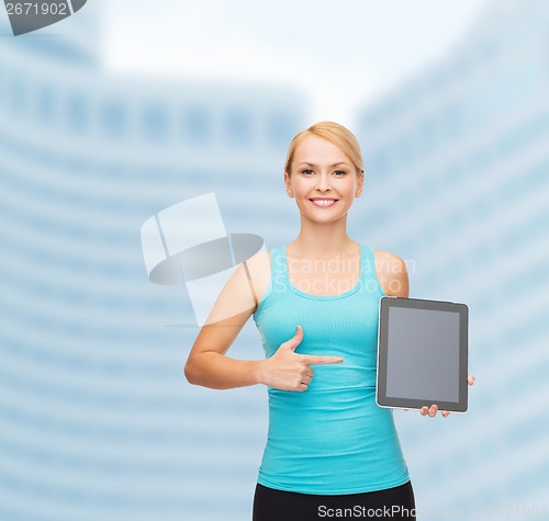 Image of sporty woman with tablet pc blank screen