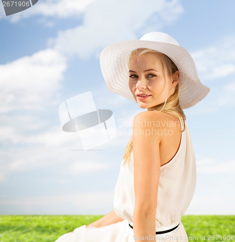 Image of beautiful woman enjoying summer outdoors