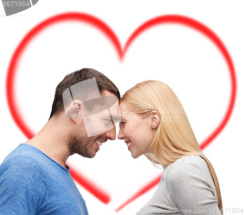 Image of smiling couple looking at each other