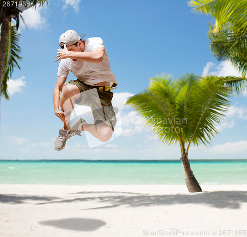 Image of male dancer jumping in the air