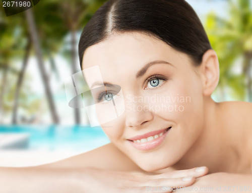 Image of smiling woman in spa salon