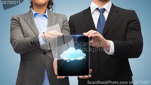 Image of businessman and businesswoman with tablet pc